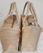Gota Patti Handcrafted Gift Bag: Transparent Pooja Favor Bag.