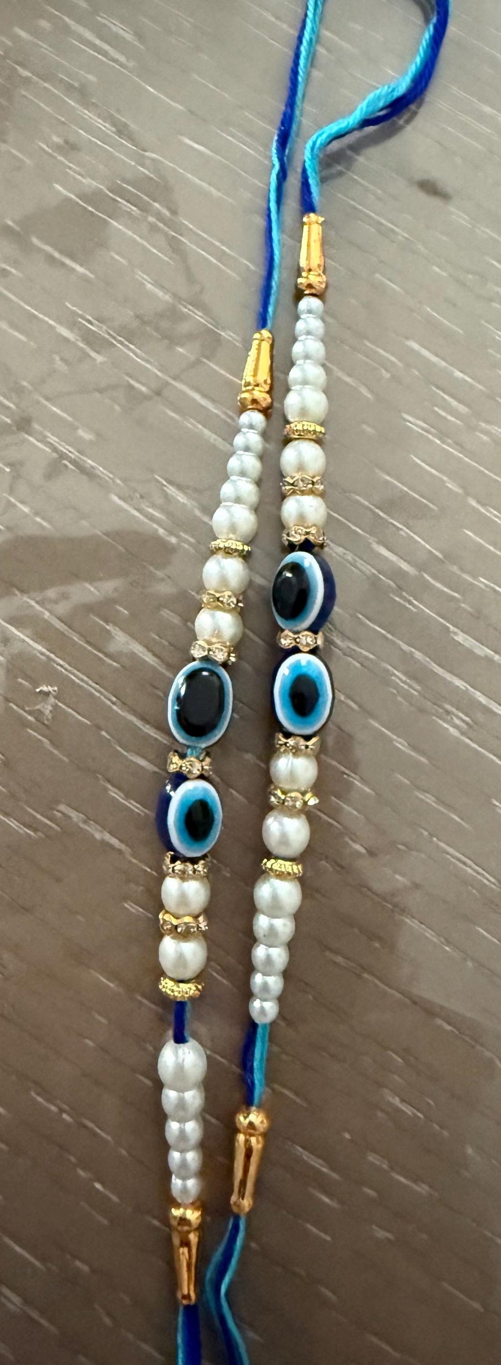 Handmade Rakhi Set: Evil Eye Rakhi, Haldi Kumkum Plate, Roli Chawal