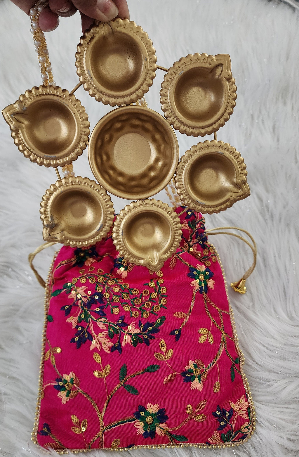 Metal Urli with 7 Diyas and Embroidered Potli Bag: Diwali Decor, 7-inch