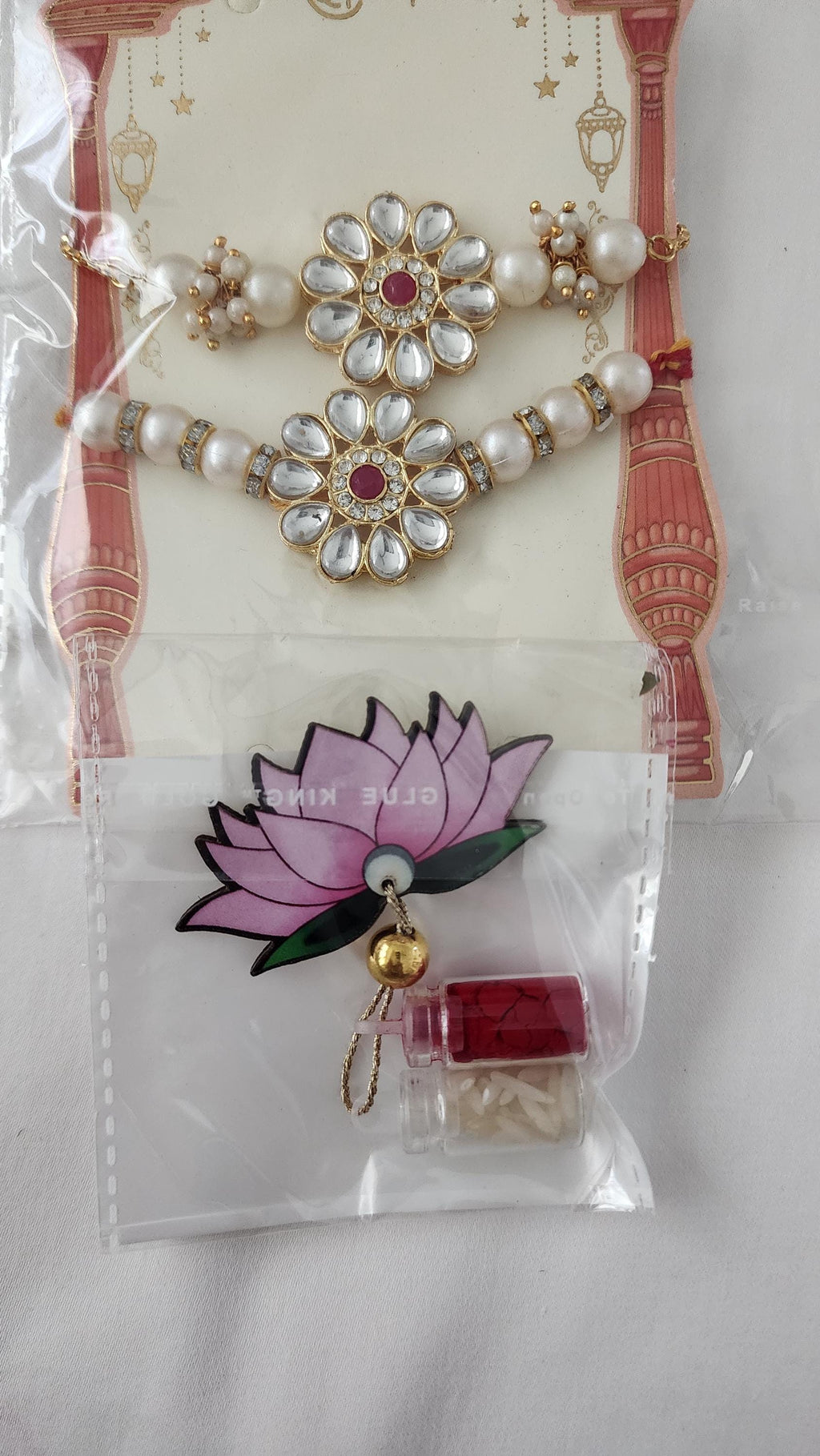 Handmade Kundan Rakhi Set: Pearl Chain Couple Rakhi with Roli Chawal