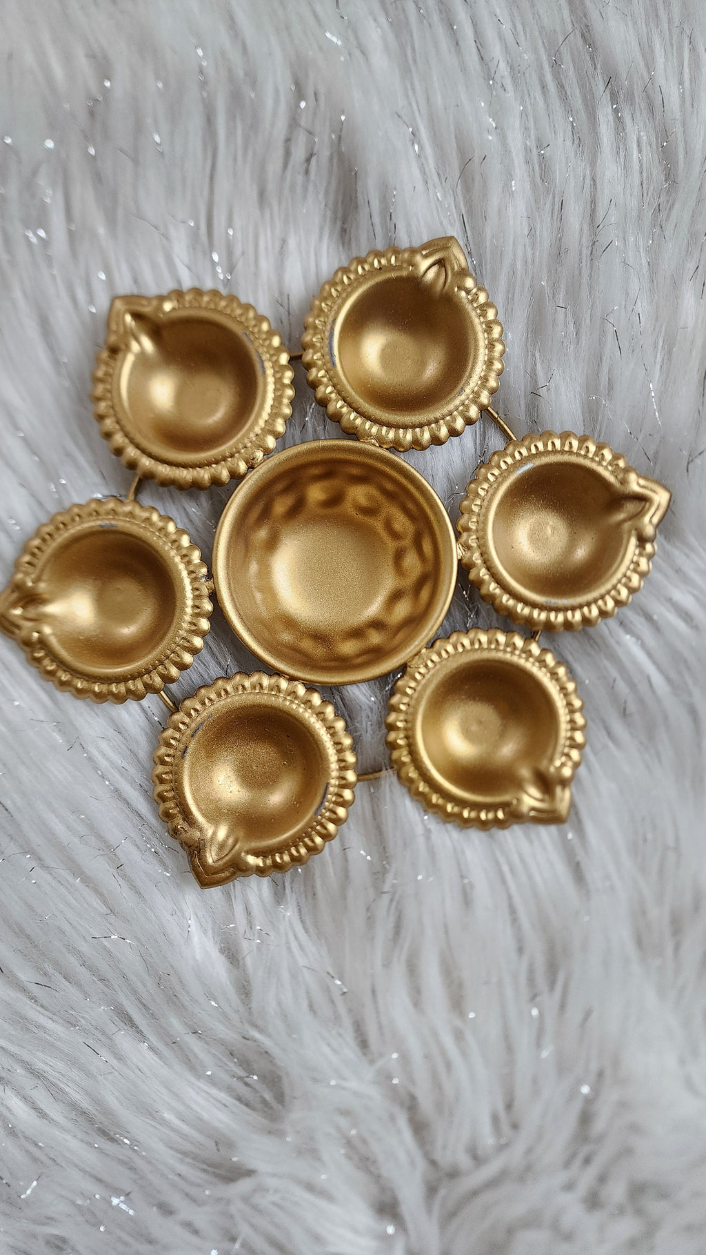 Metal Urli with 7 Diyas and Embroidered Potli Bag: Diwali Decor, 7-inch