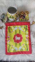 Pichwai Print Potli Bag Set: Nandi Jar & Haldi Kumkum Plate.