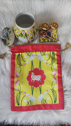 Pichwai Print Potli Bag Set: Nandi Jar & Haldi Kumkum Plate.