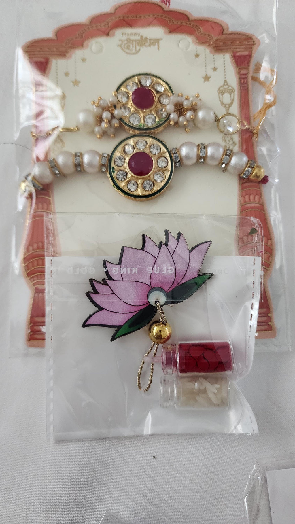 Handmade Kundan Rakhi Set: Pearl Chain Couple Rakhi with Roli Chawal
