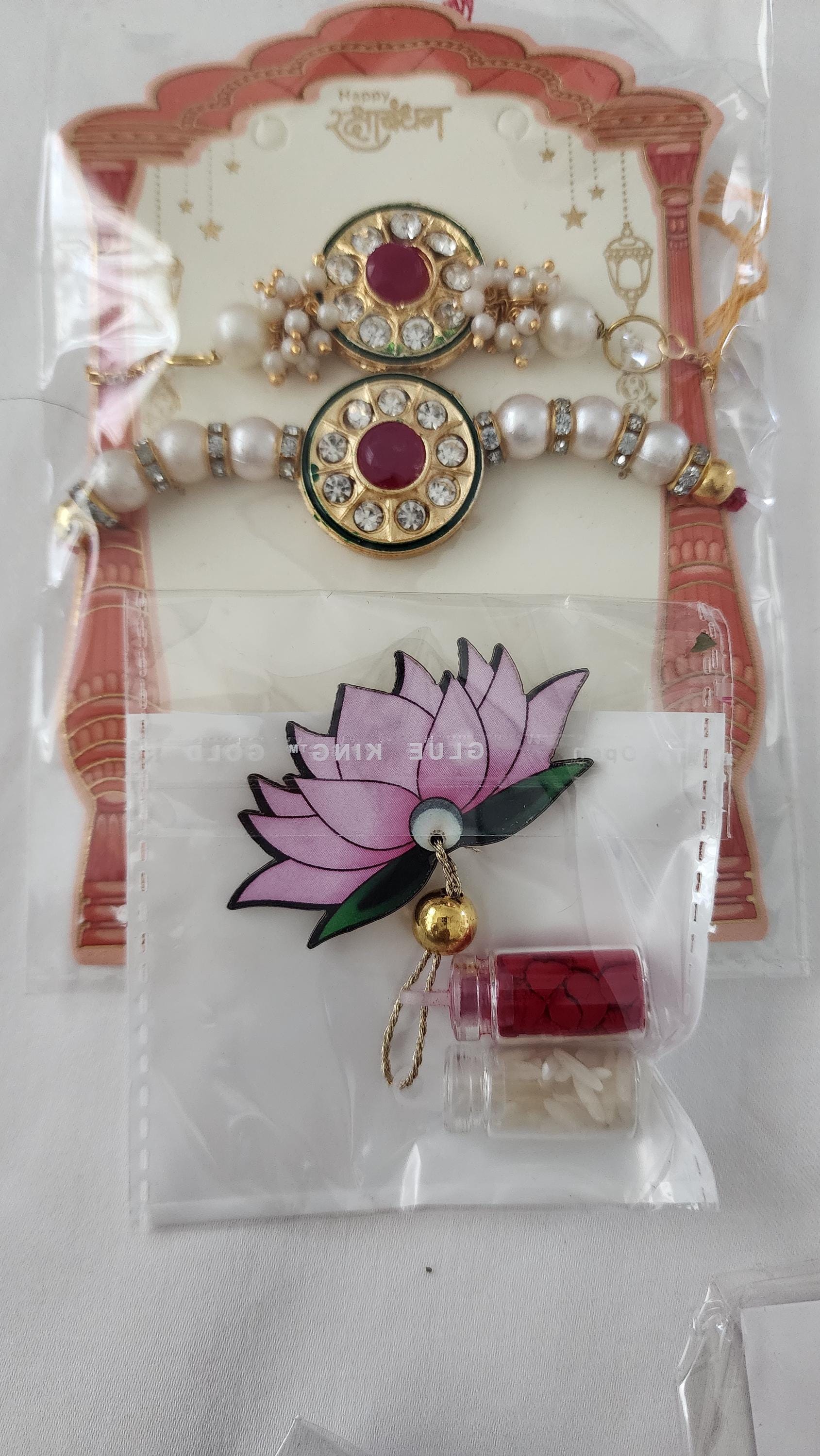 Handmade Kundan Rakhi Set: Pearl Chain Couple Rakhi with Roli Chawal