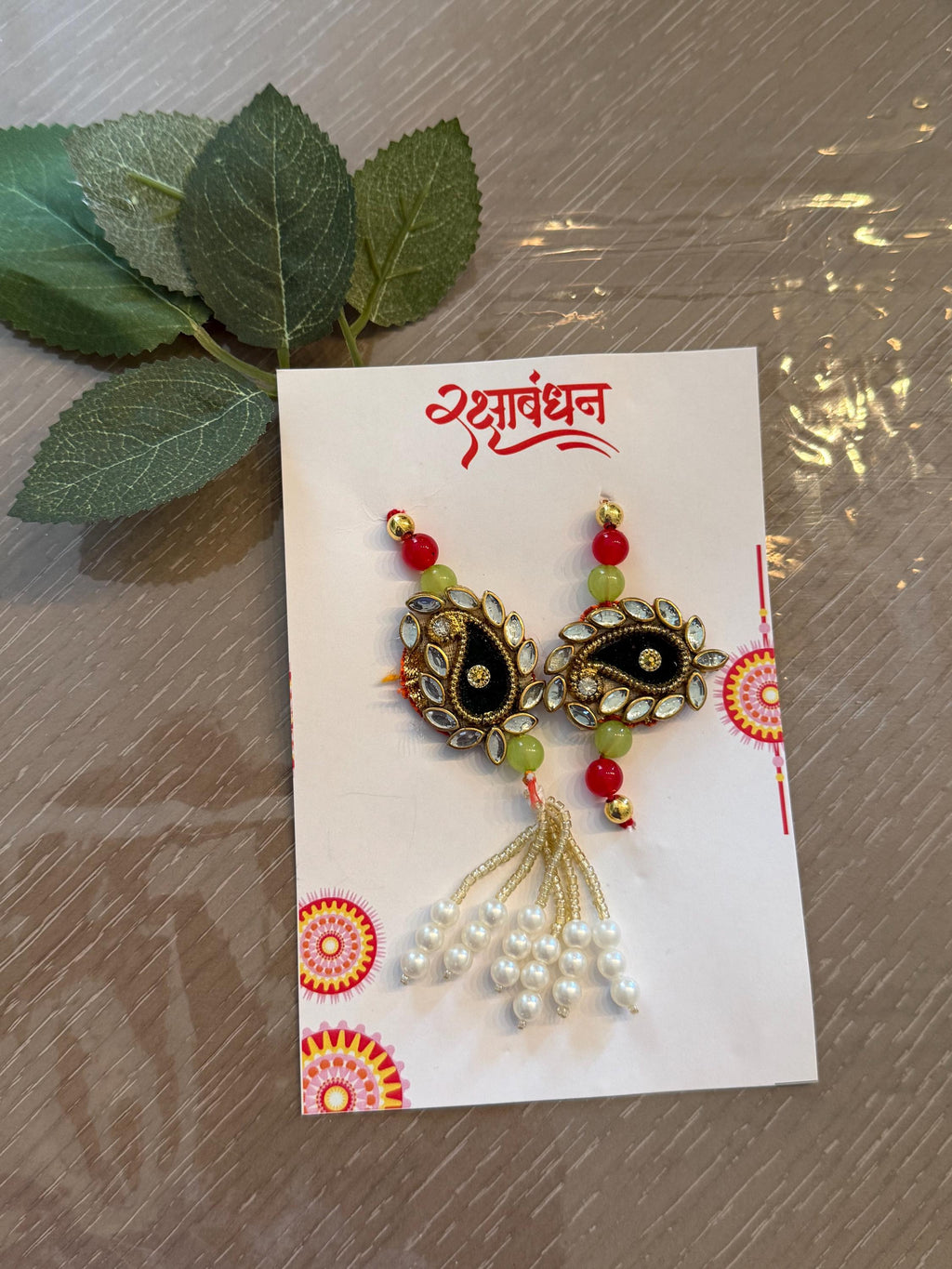 Handmade Kundan Couple Rakhi Set: Pearl Chain, Roli & Chawal